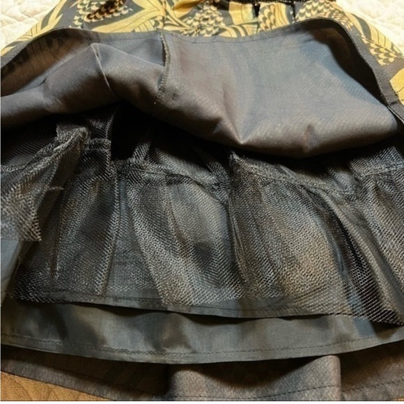 Nanette Lepore size 2. Gorgeous Black and gold Cocktail dress . Beaded waist . - Picture 6 of 6